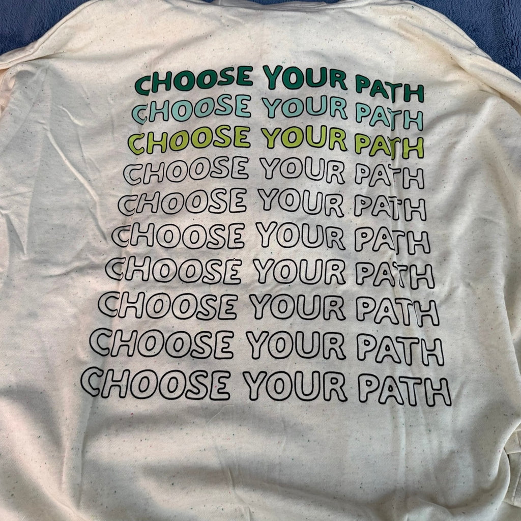 Choose Your Path repeating graphic on the back of the cream Star Wars hoodie