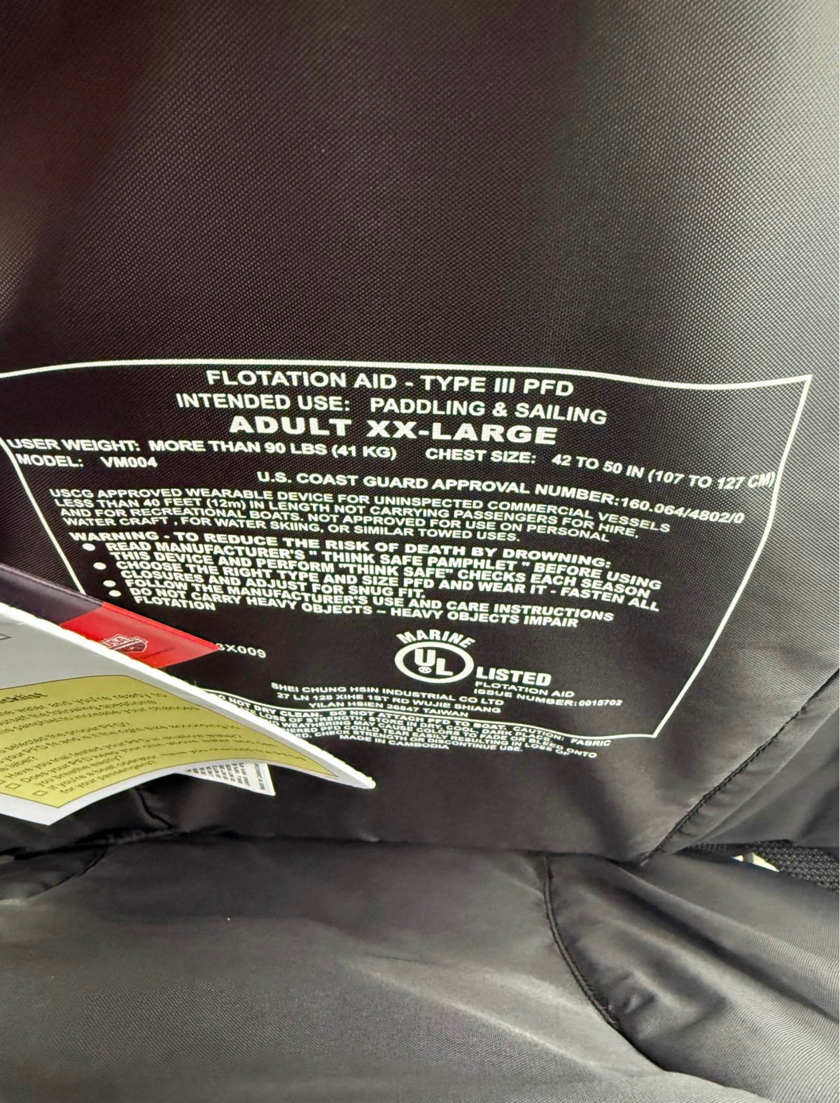 Detail of safety and usage information inside Speedo PFD