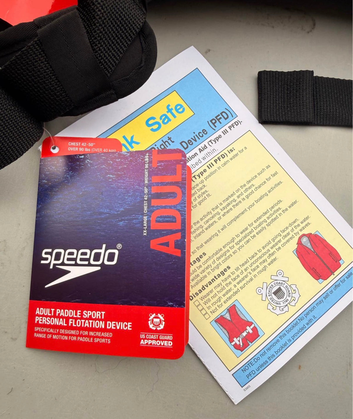 Tags and safety booklet of Speedo Adult Paddle Sport PFD Life Jacket