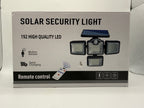 Front view of Solar Security Light box showing 192 LEDs and remote control