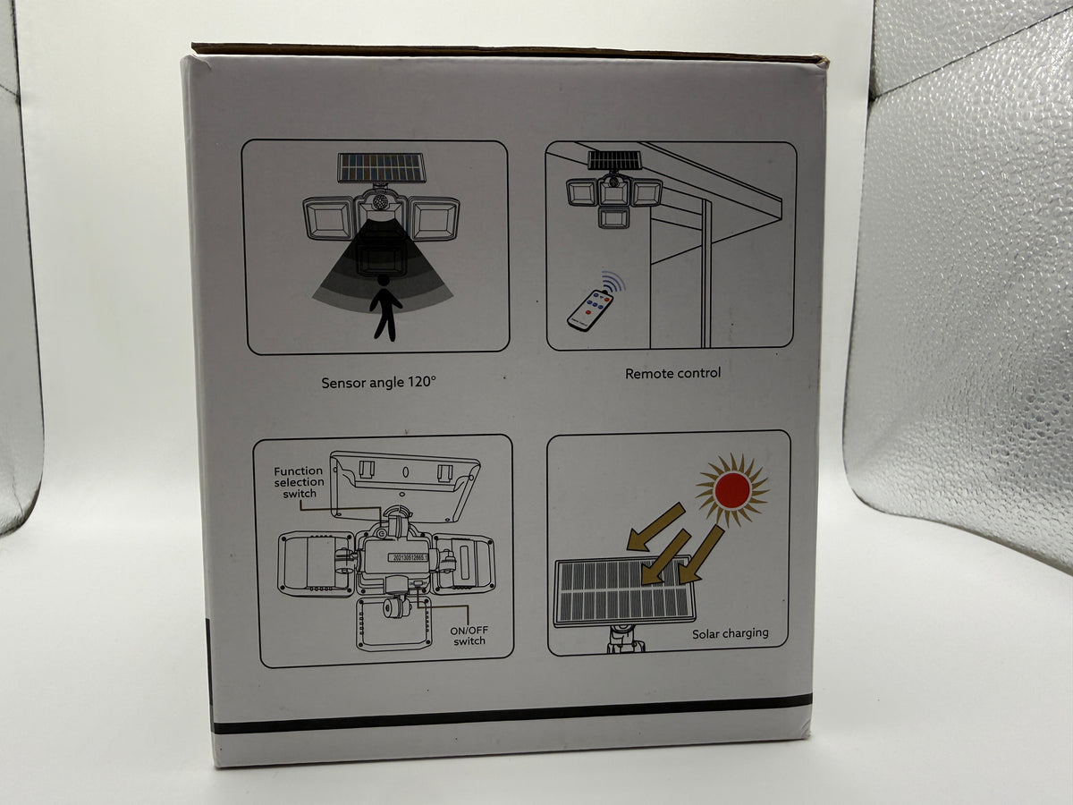 Back side of Solar Security Light box showing sensor angle, remote control usage, function switch and solar charging