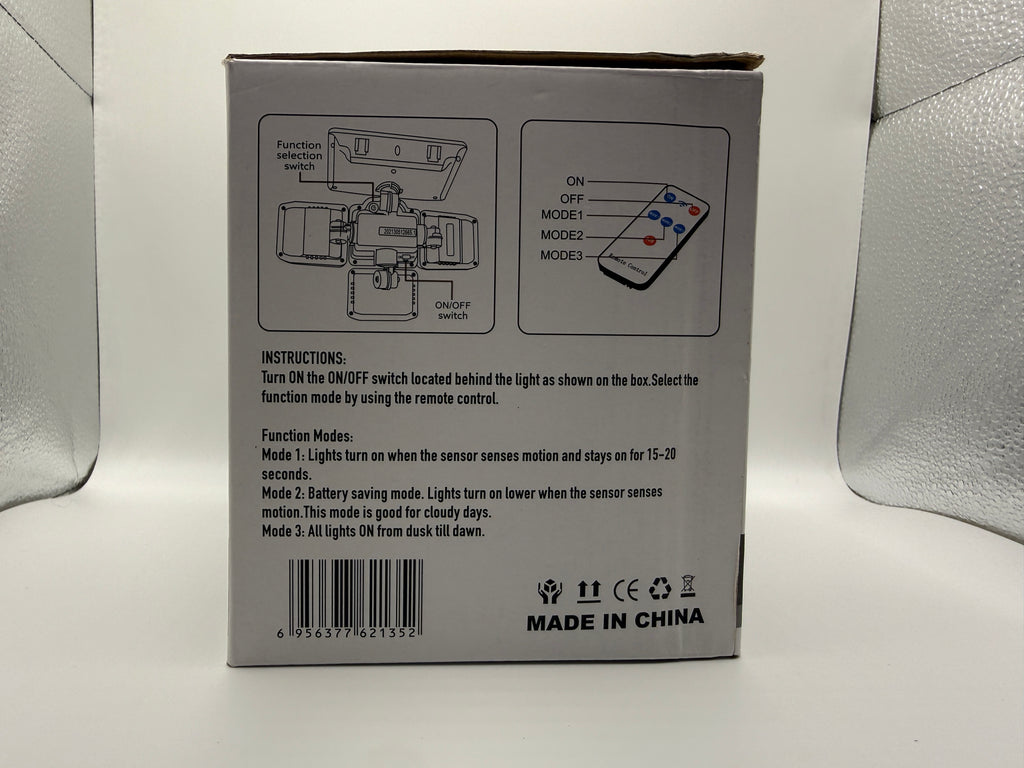 Side panel of the box with instructions for ON/OFF and function modes
