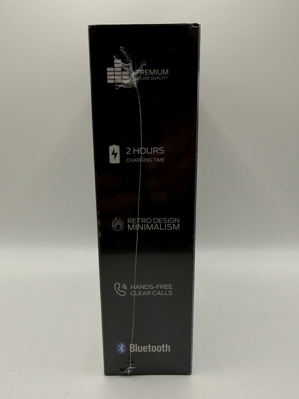 Side view of Monster Aura Fit XH11 headphone packaging with features