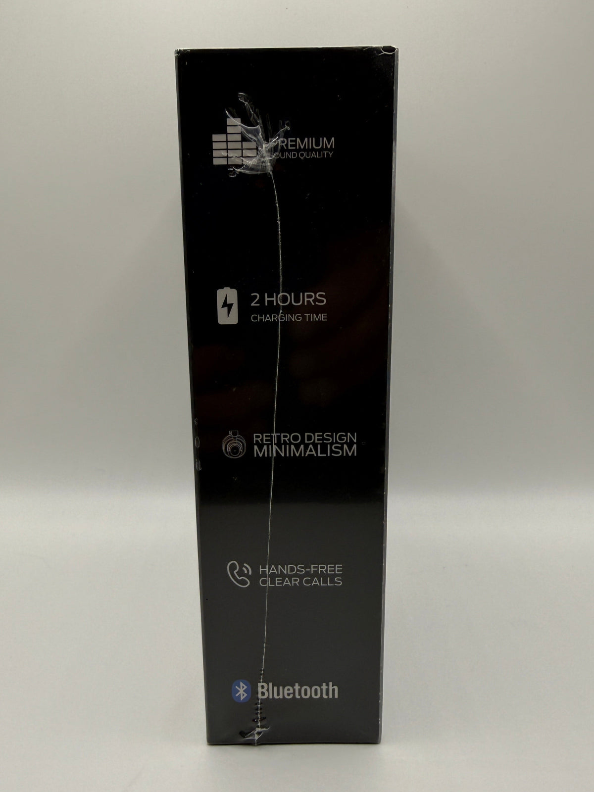 Side view of Monster Aura Fit XH11 headphone packaging with features