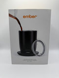 Ember temperature control cup pouring coffee
