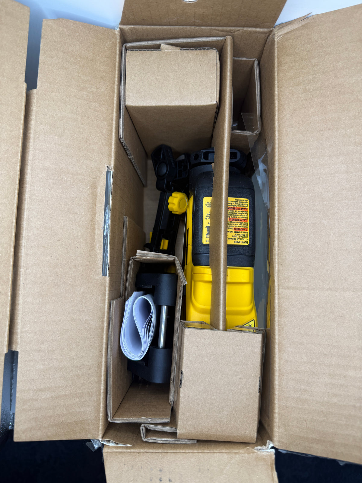 Inside packaging showing copper cutter attachment and included components