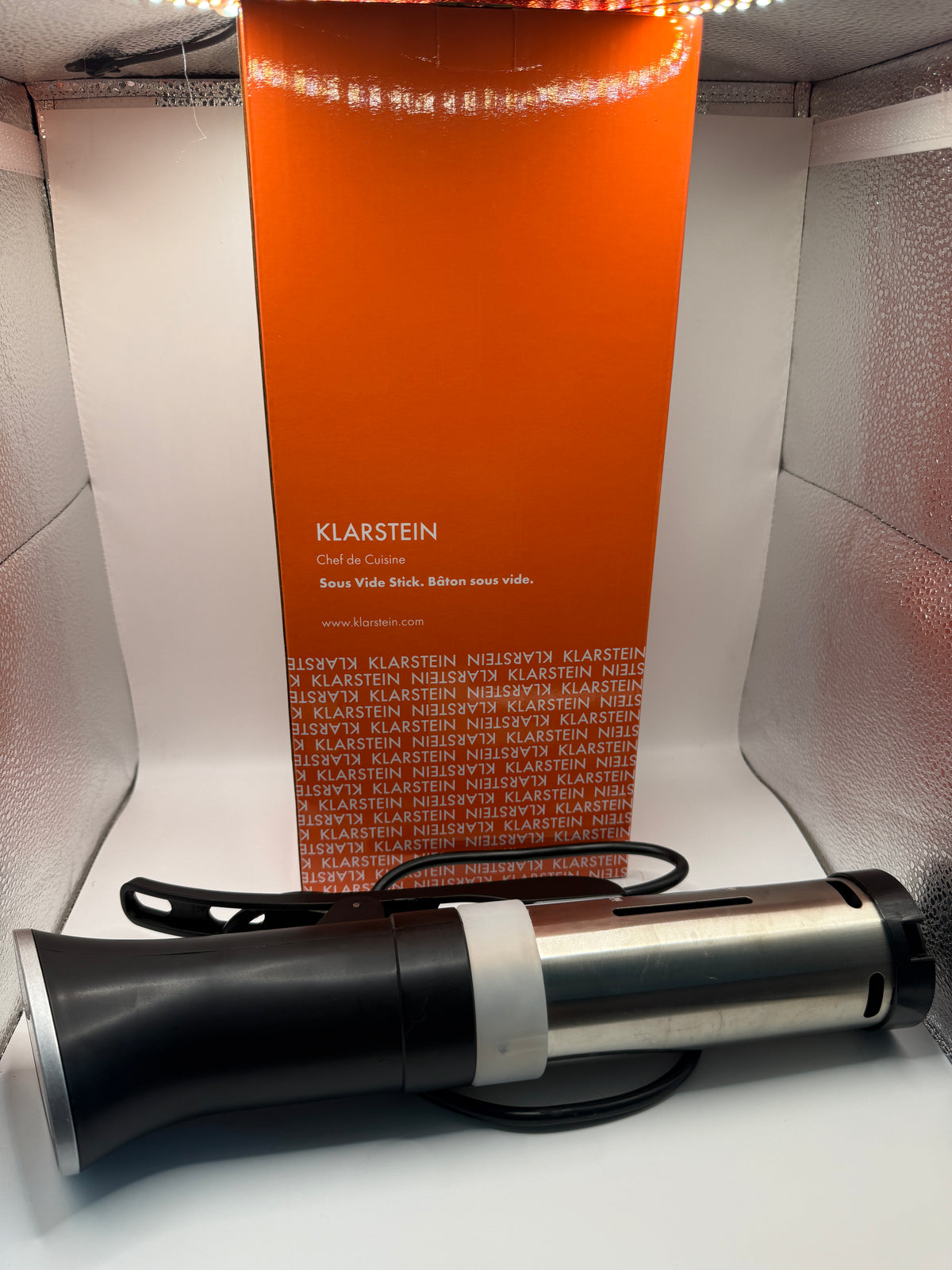 Klarstein Chef de Cuisine Sous Vide Stick with orange packaging behind