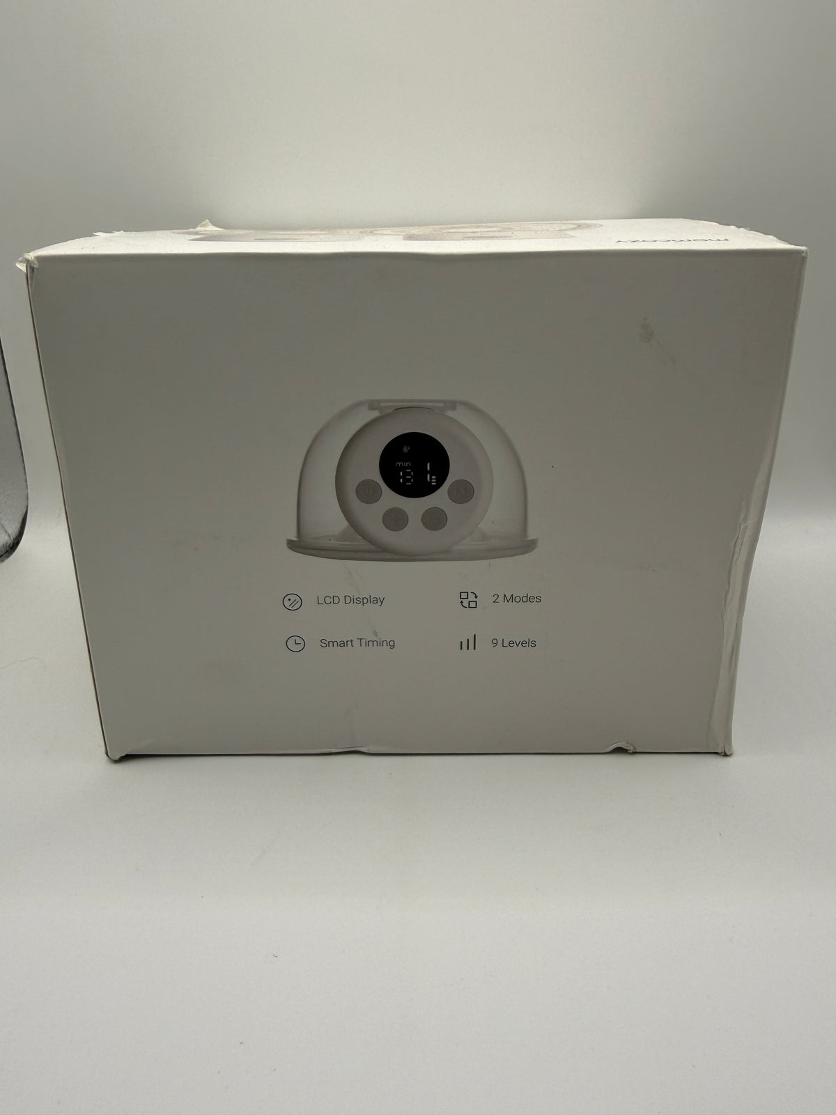 Momcozy S12 breast pump LCD display and features on box back