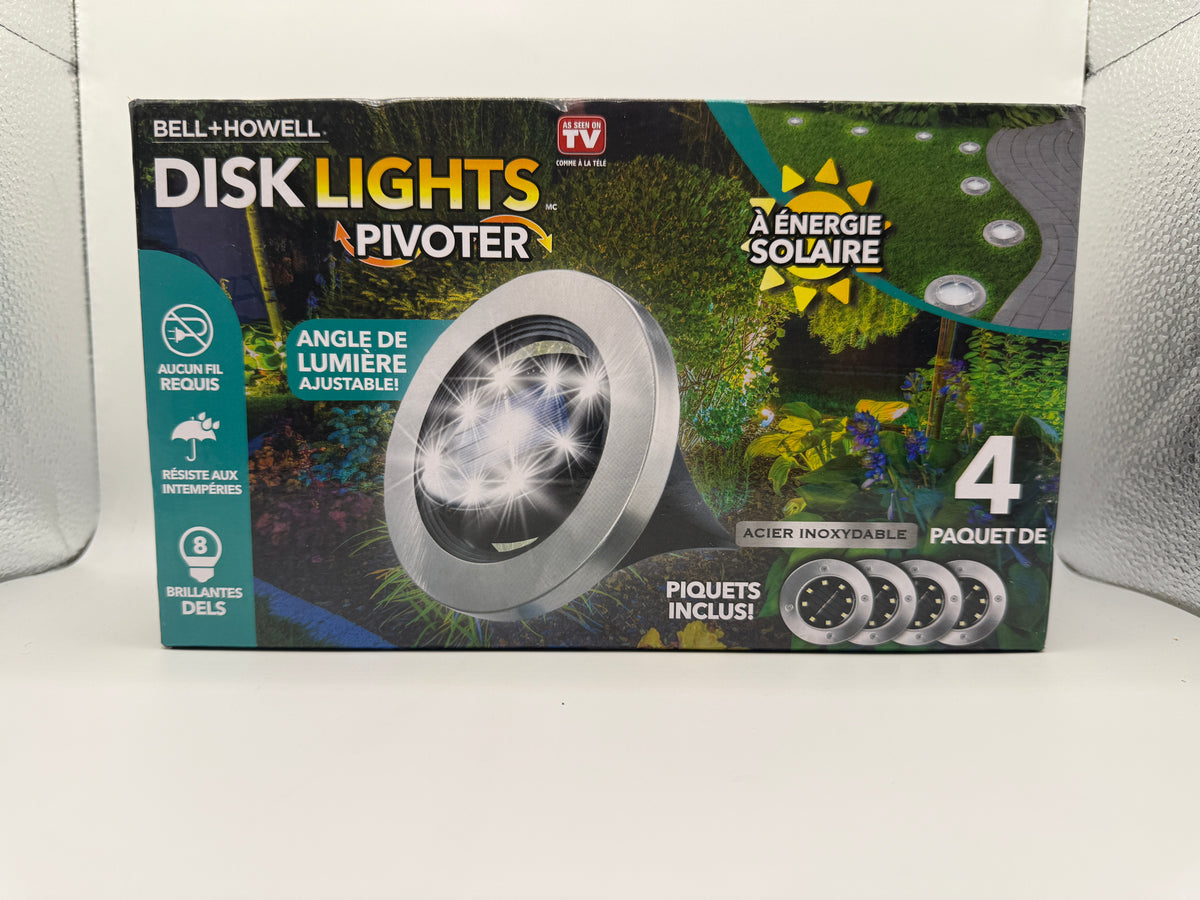 Box front showing Bell+Howell Disk Lights Pivoter solar powered LED lights 4 pack