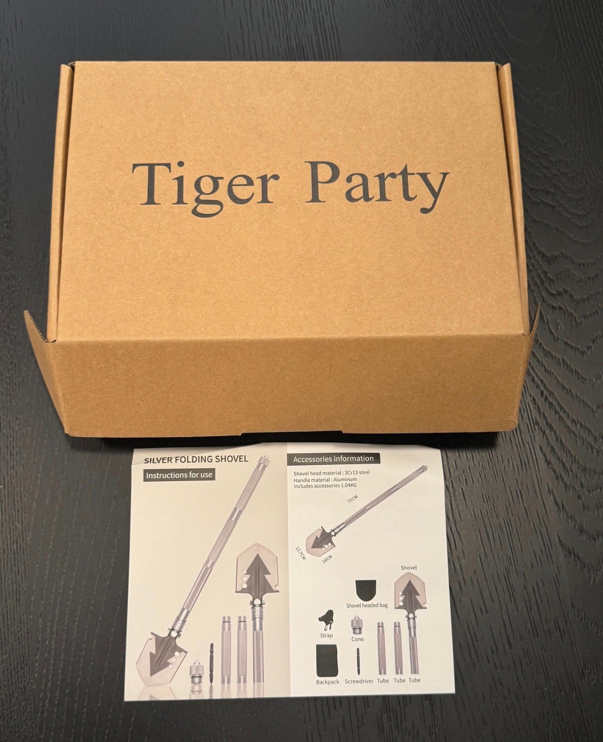 Tiger Party box packaging with shovel set and instruction manual