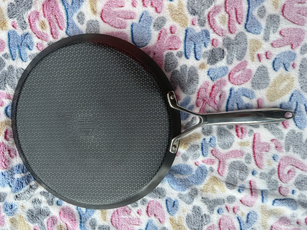 Hexclad Hybrid 12 inch Griddle Pan bottom view with Hexclad logo and handle