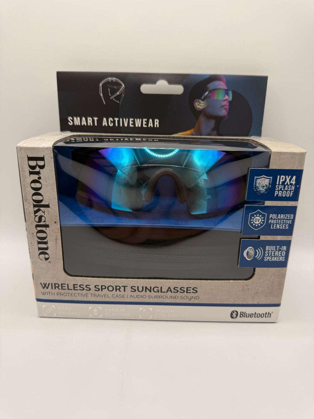 Front view of Brookstone Wireless Sport Sunglasses packaged