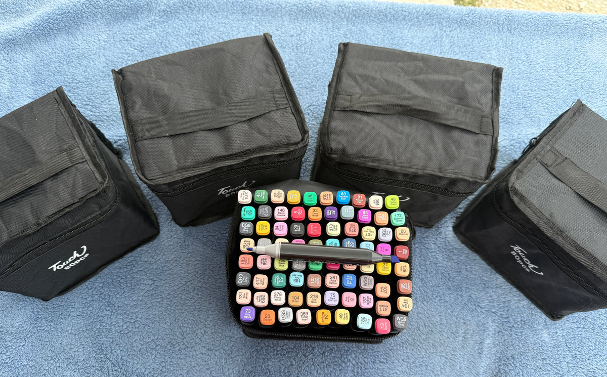 Set of black carry cases for 80 count markers