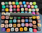 Top view of 80 count dual tip markers with visible color codes
