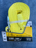 Side view of Smart Straps yellow tow strap with hook ends in packaging