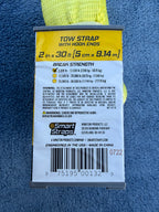 Back packaging label showing tow strap specs and barcode