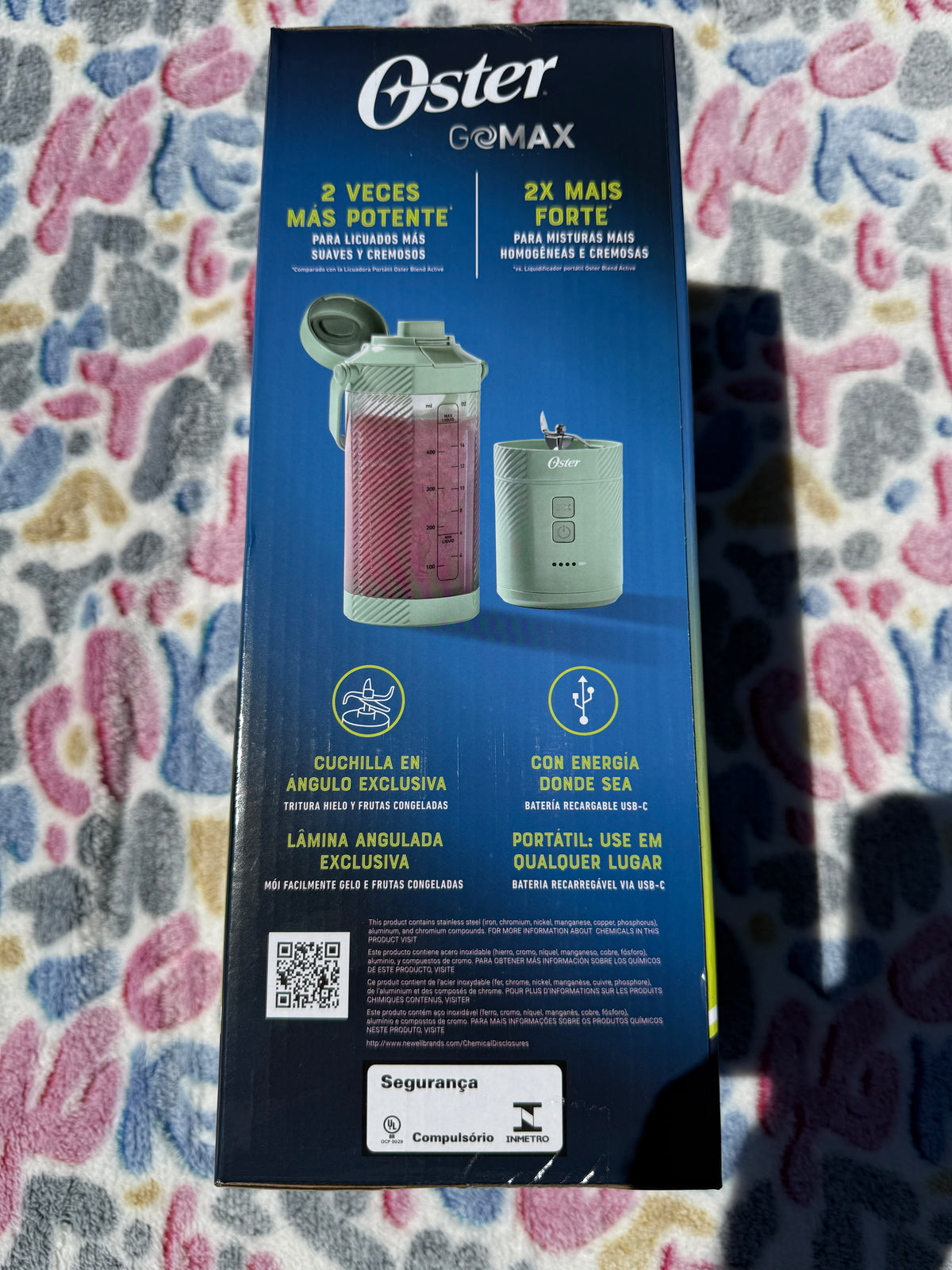Oster GoMax Portable Blender box side with features in Spanish and Portuguese