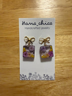 Handmade Hanachica earrings with purple and yellow flowers in resin