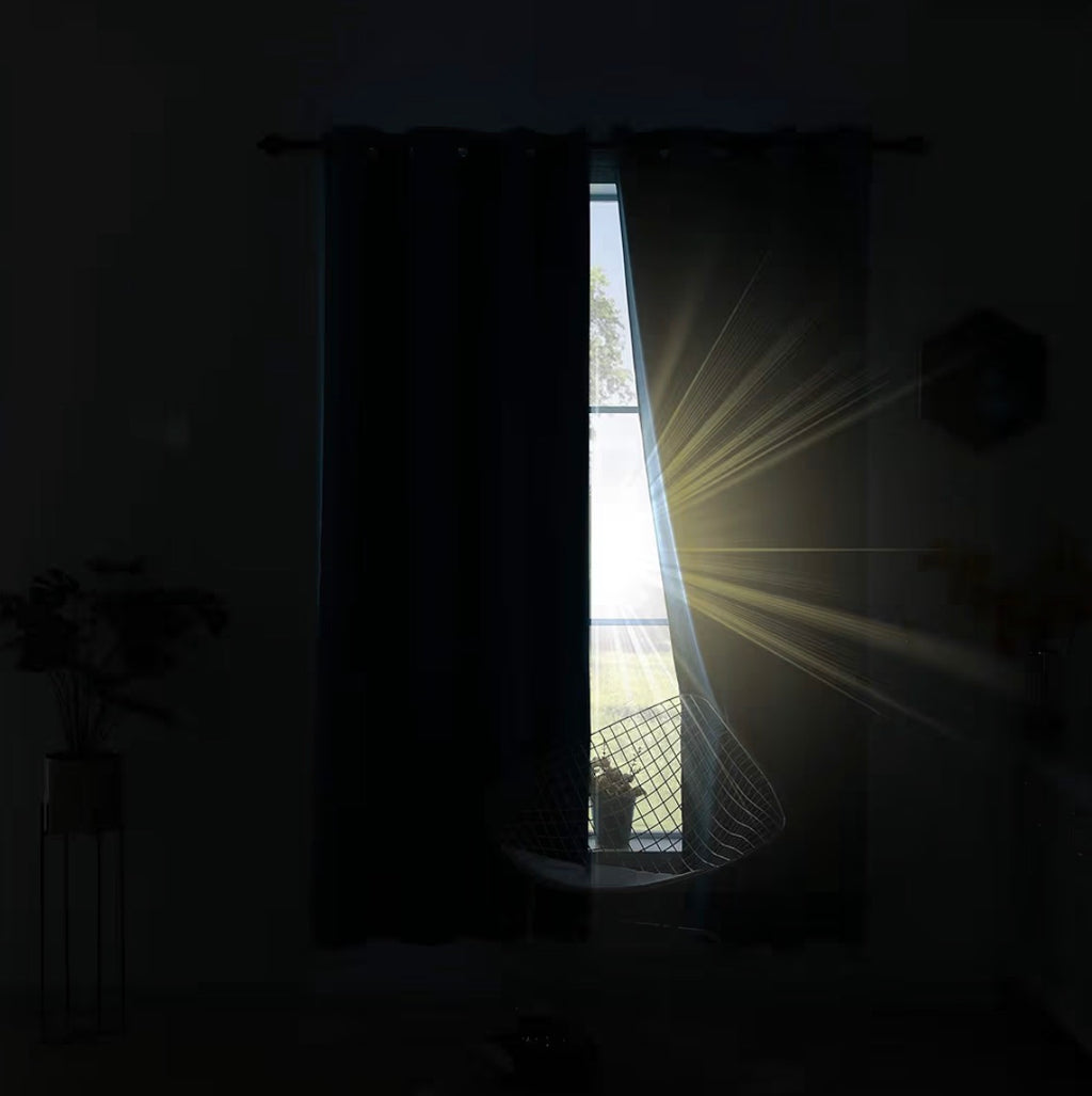 Light blocked by Koufall teal blackout curtains in dark room