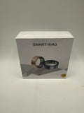 Smart Ring in gold and black displayed on box front