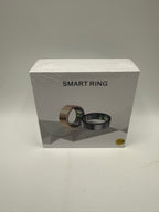 Smart Ring in gold and black displayed on box front