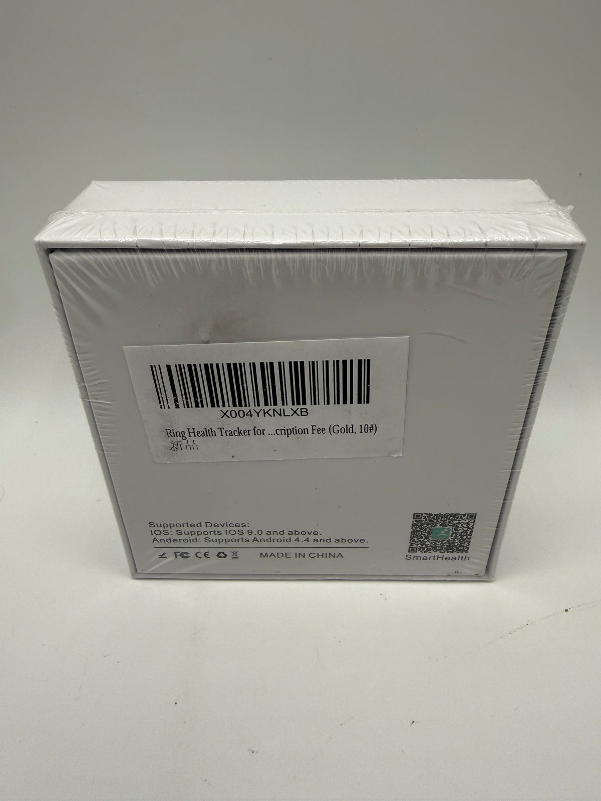 Back of Smart Ring packaging showing supported devices and QR code