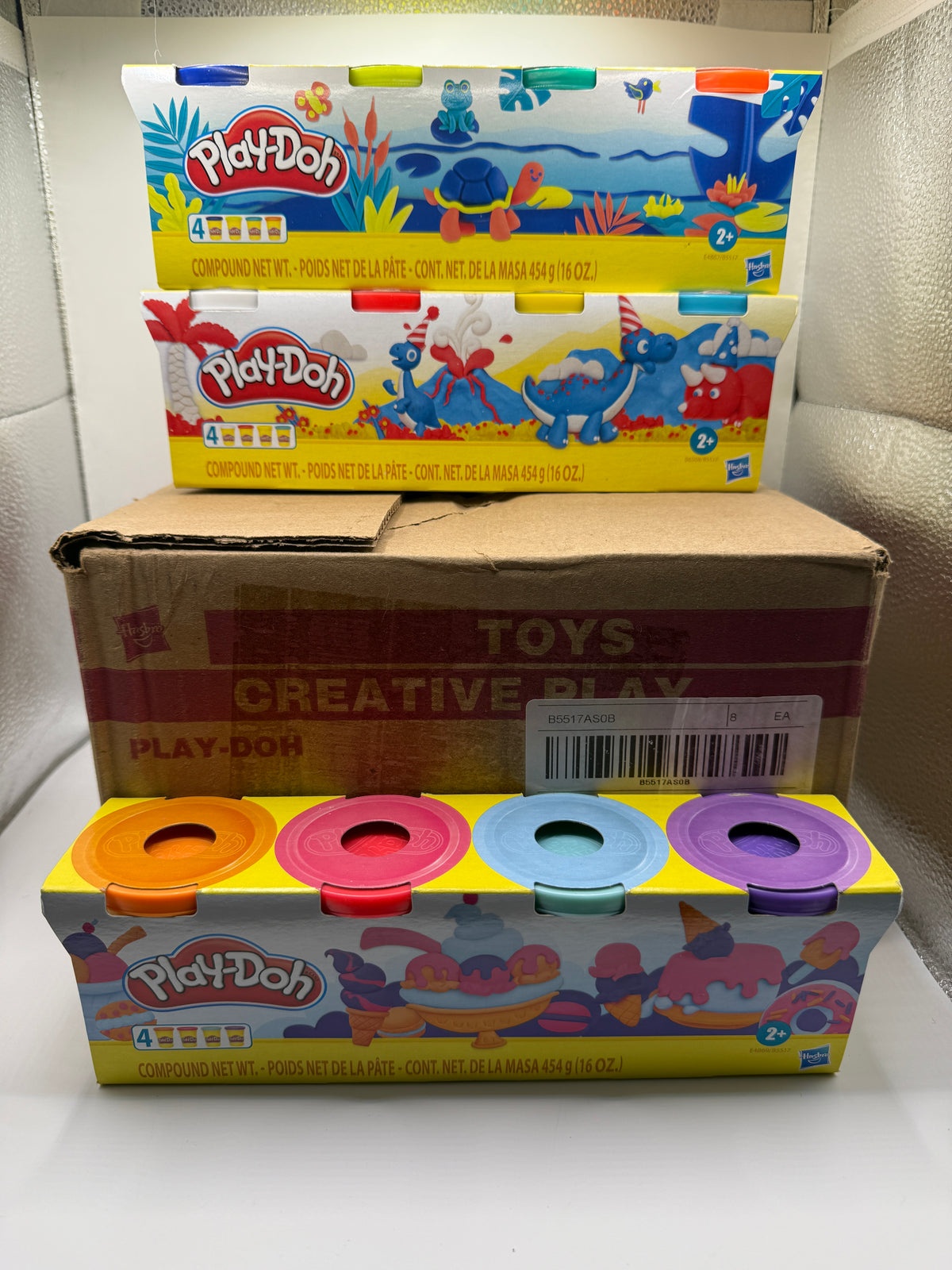 Play-Doh 4-pack with orange, red, blue, purple colors