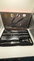 Close-up of Penthouse marble coated knives and peeler
