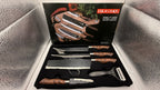 Opened box showing knives, peeler, and scissors in foam insert