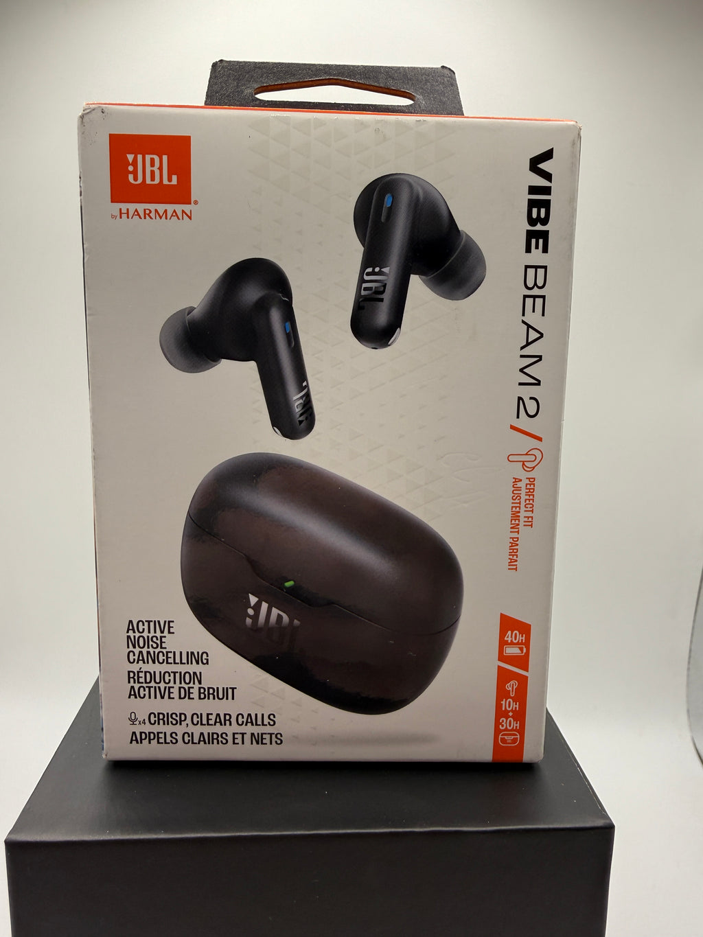 JBL Vibe Beam 2 wireless earbuds and charging case front view