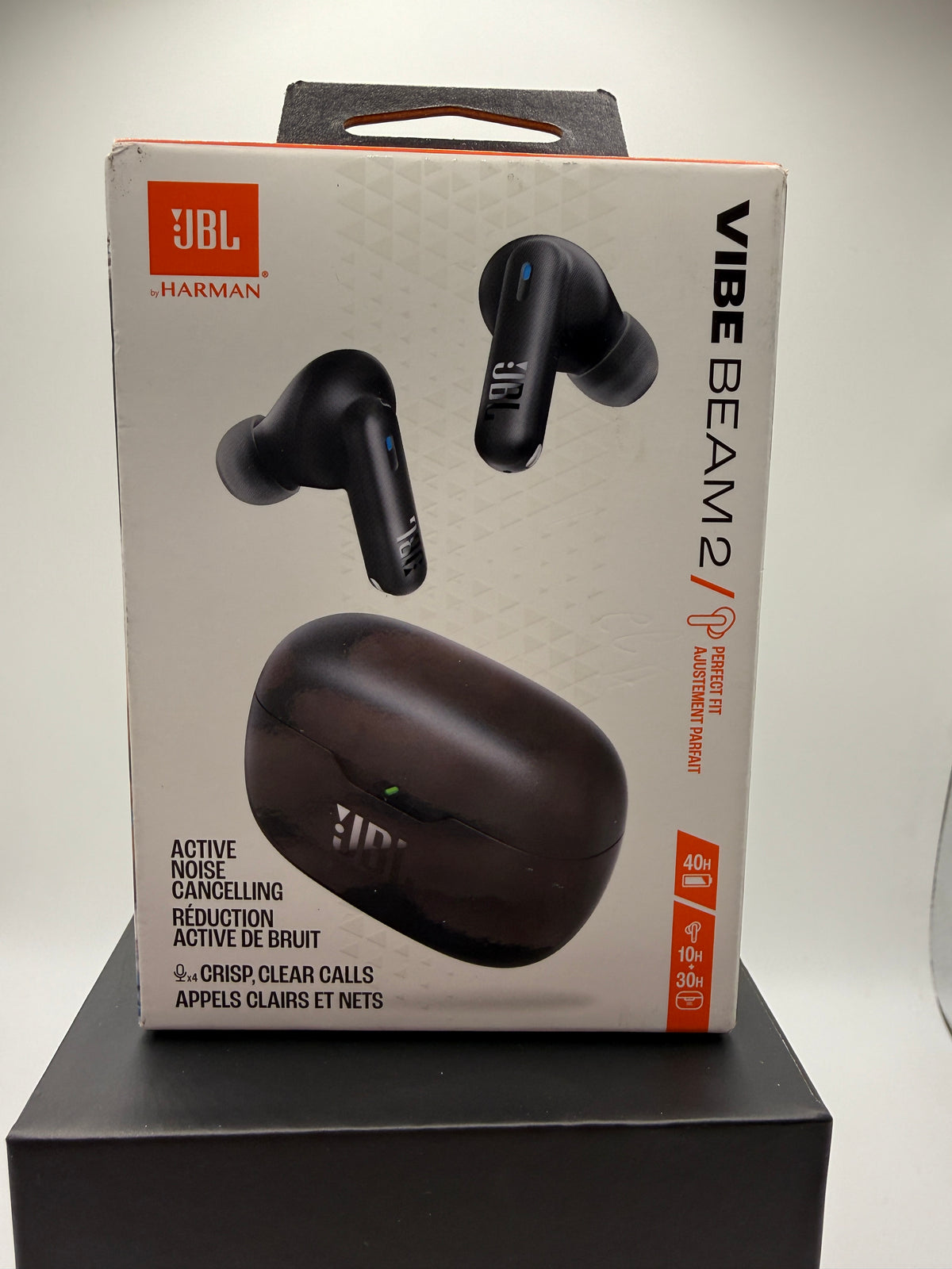 JBL Vibe Beam 2 wireless earbuds and charging case front view