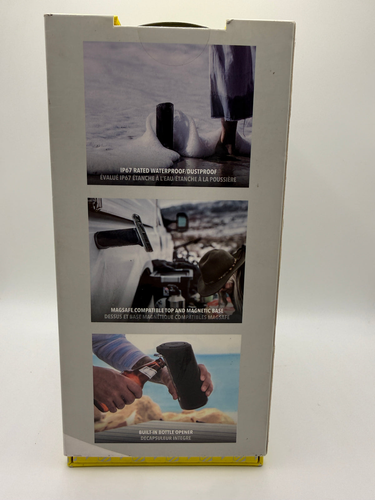 Side of box with images of waterproof, magnet mount, bottle opener features