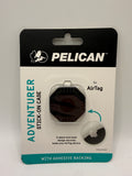 Front view of Pelican Adventure Stick-On Case for AirTag blister packaging