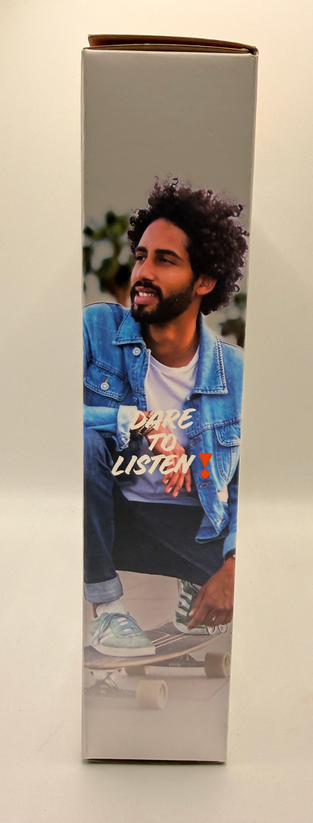 JBL Tune 520BT Side Package Showing Model Wearing Headphones