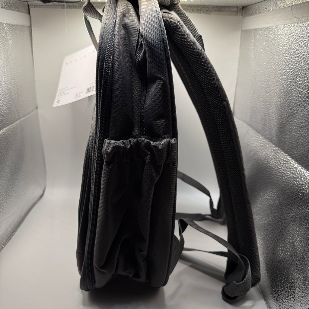 Side view highlighting elastic bottle pocket on bb gear diaper backpack