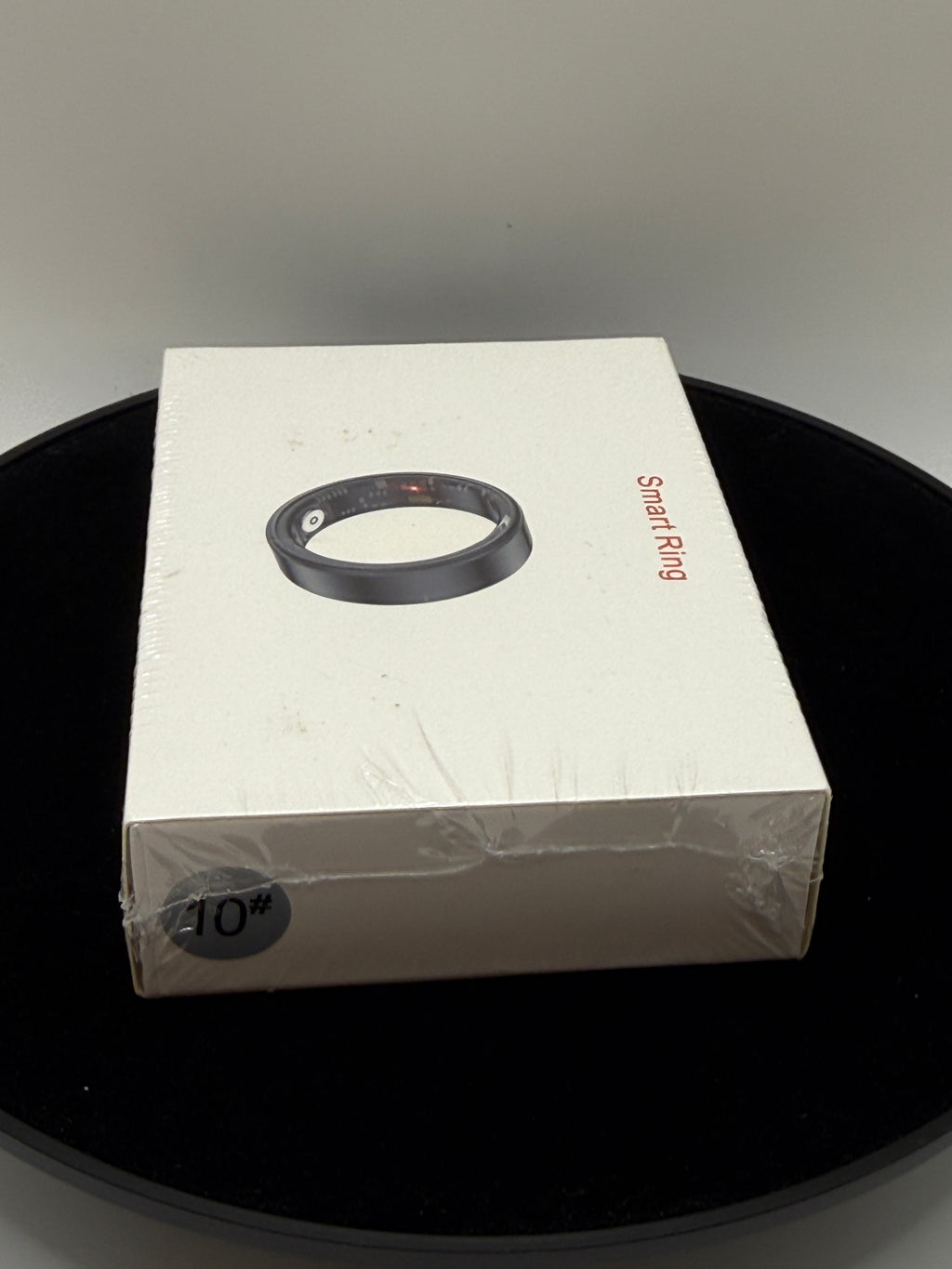 Top angled view of sealed Smart Ring box showing size 10 label