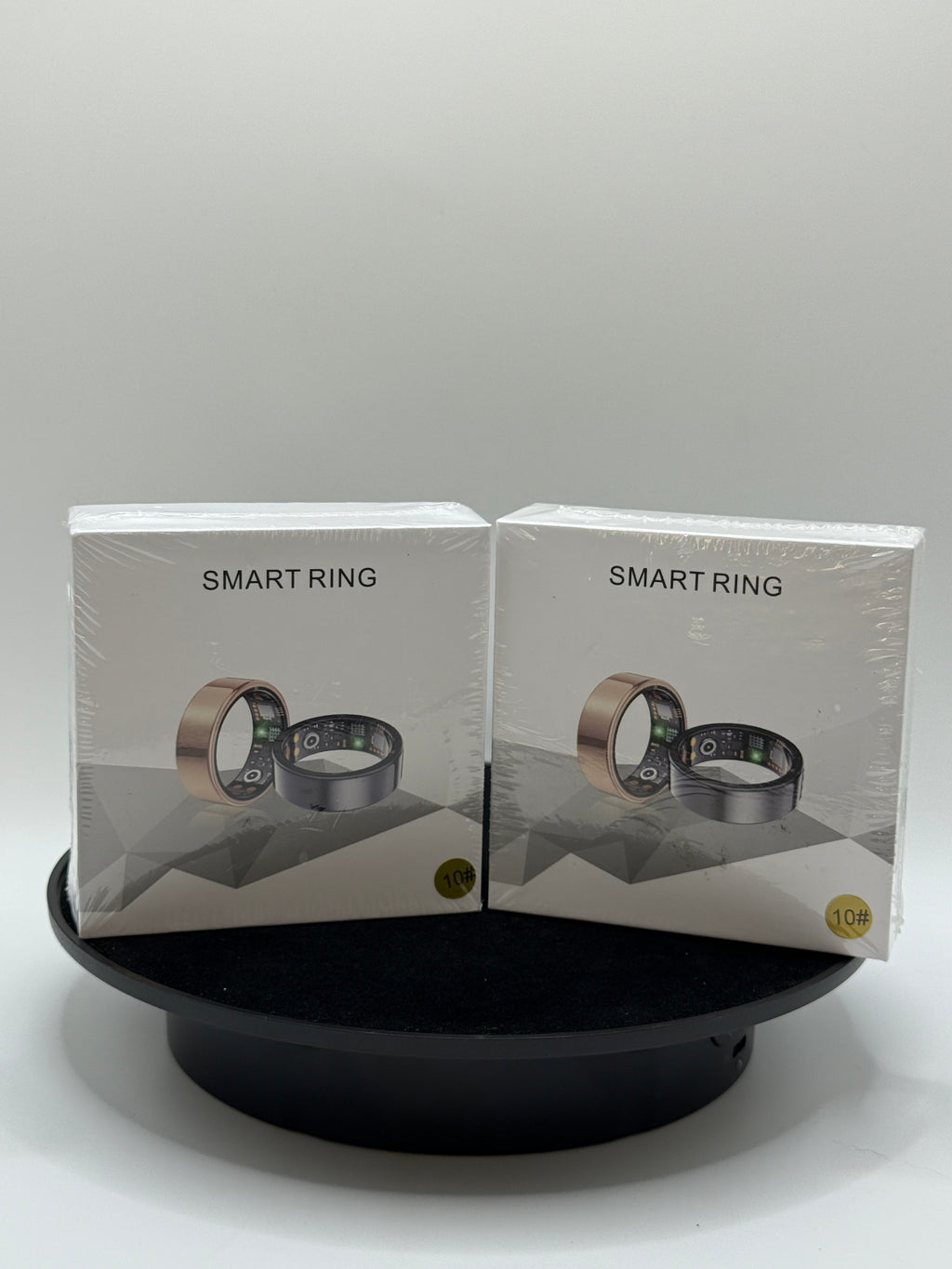 Smart Ring Health Tracker in gold and black, size 10, front packaging