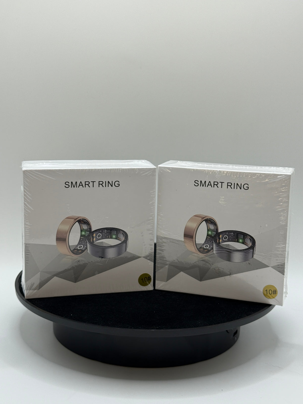 Smart Ring Health Tracker in gold and black, size 10, front packaging