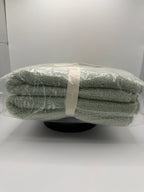 Side view of WELLBE hand towels folded and tied