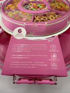 Close-up of rotating snack box compartments filled with snacks