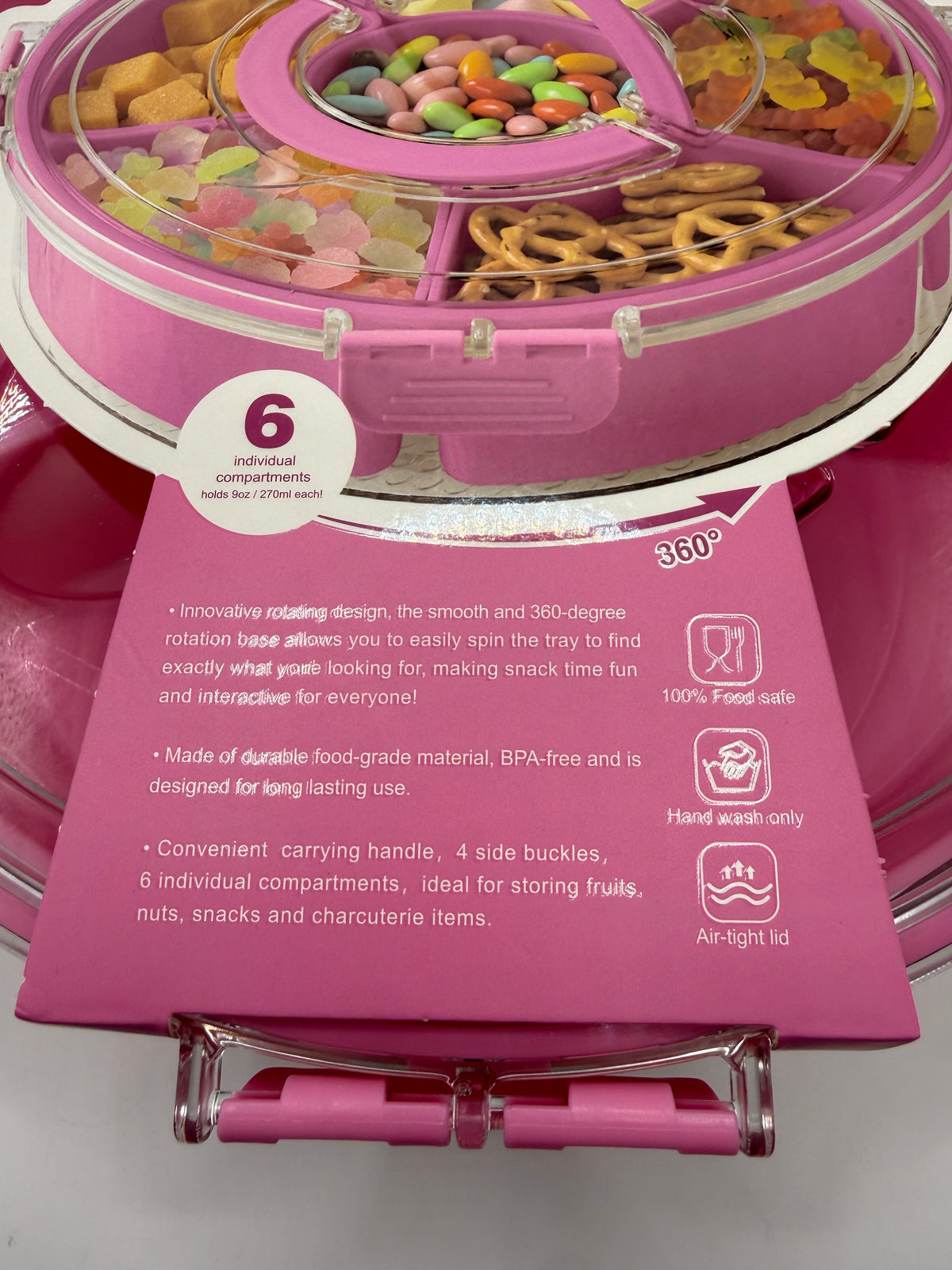 Close-up of rotating snack box compartments filled with snacks