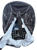 Interior of black Spider-Man mask showing rear zipper and plastic backing