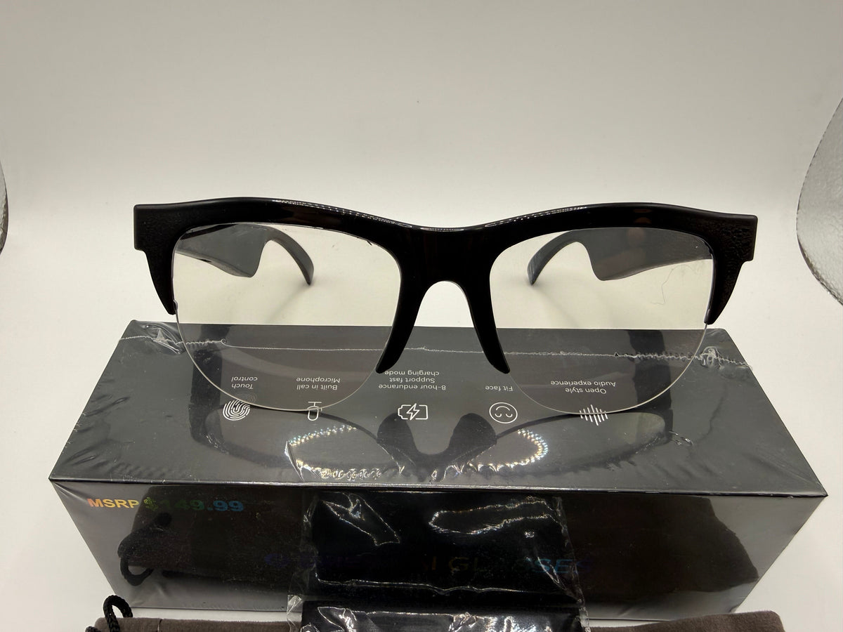 Marketplace239 LLC CHIMES AI smart audio glasses with black frames and clear lenses resting on their product box.