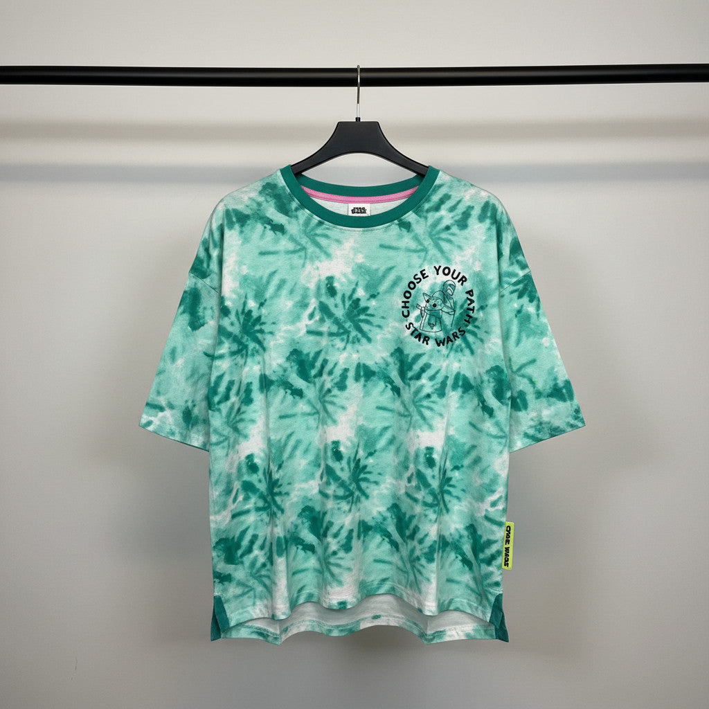 Disney Star Wars Grogu Choose Your Path green-and-white tie-dye T-shirt on a hanger