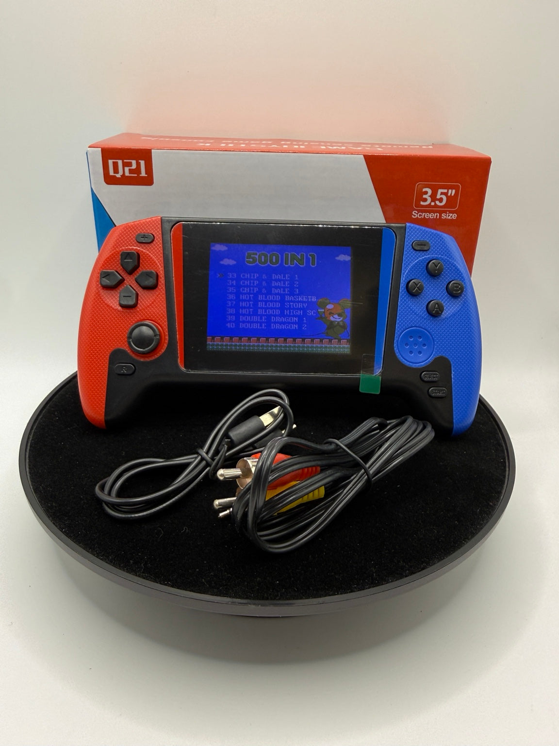 Red and blue Q21 500-in-1 single-player handheld game console with USB cable, AV cable and box