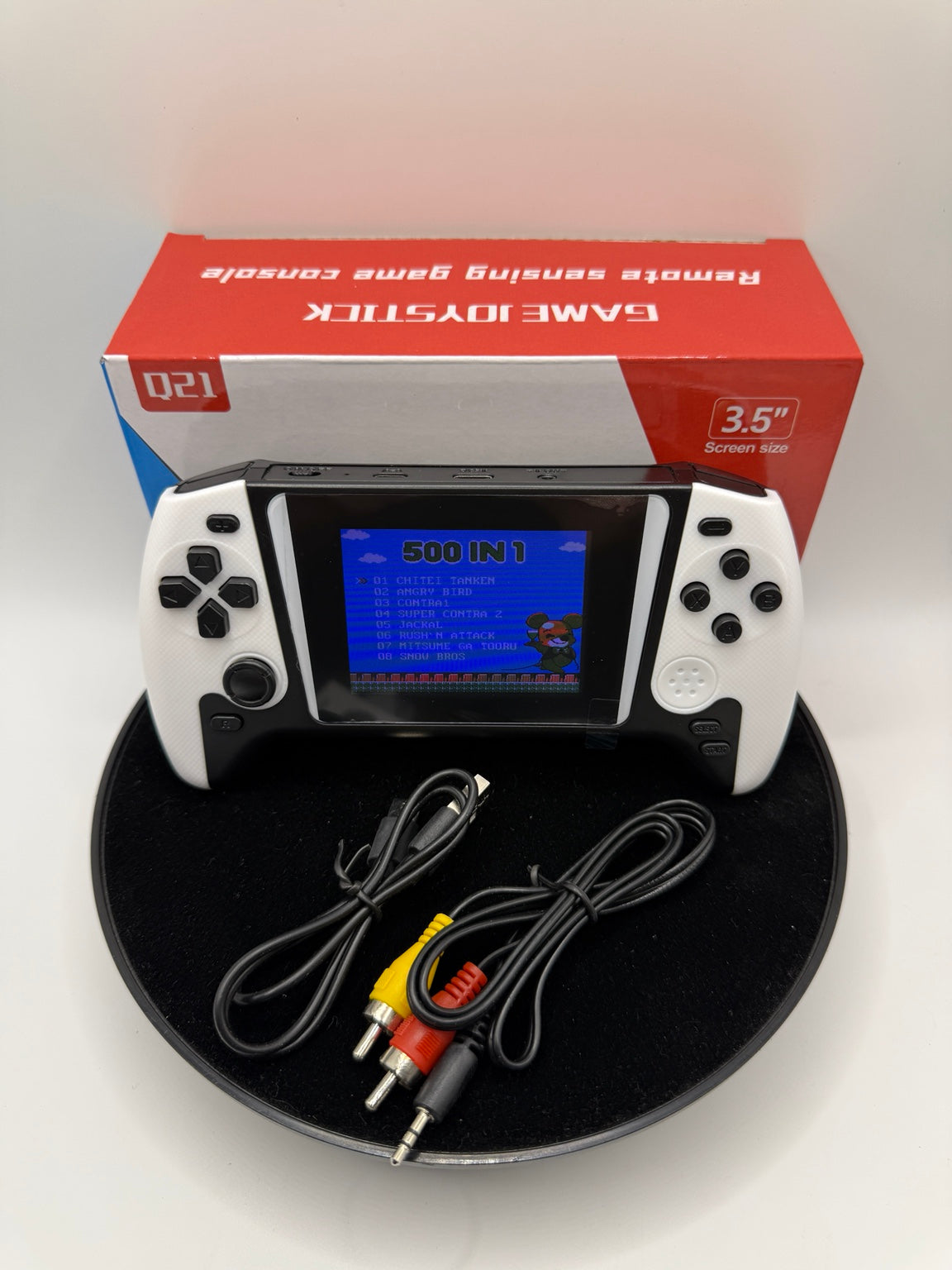 White Q21 500-in-1 single-player handheld game console with USB cable, AV cable and box